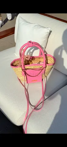 Jacquemus Small straw basket bag with pink leather trim and long strap