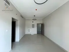 Two-bedroom apartment with a living room for annual rent in Ajman, Al Rashidiya 1 area. It is brand 