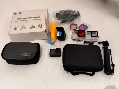 GoPro HERO 12 + Accessory Kit with Carry Cases, Floating Handle and Filters and stick