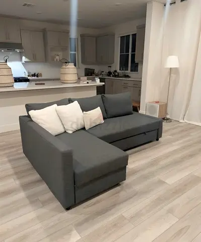 Grey L-shaped Sofa bed with Storage - Good Condition IKEA