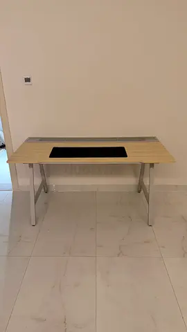 Light wood study/office desk with metal legs and cable management slot