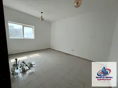 One-bedroom and living room unit in Al Qulay'ah, Sharjah. Features super-deluxe finishes, a bedroom
