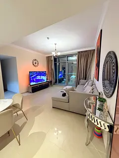 Two-bedroom + living room apartment with a sea view for monthly rent in Ajman Corniche Residence -