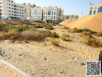 قطعة أرض تجارية معتمدة بمبنى طابق أرضي + 10 للبيع