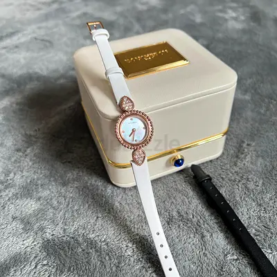 Ladies Rose Gold Bezel White Strap Dress Watch (with extra black strap)