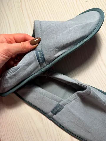 Light grey Emirates airline travel slippers