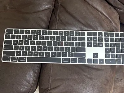 Apple Magic Keyboard section with Touch ID A2520