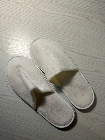 Pair of white terry spa slippers