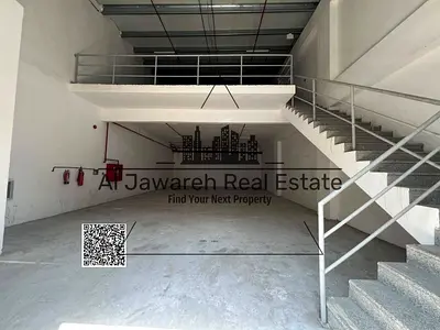 A prime warehouse with a mezzanine is available for rent in Ajman, Al Jurf Industrial 1. The property is strategically located on a main road,