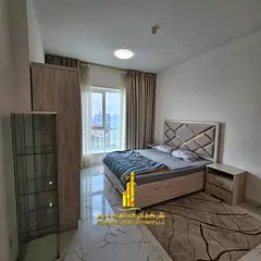 Luxury apartment, second occupancy, one bedroom and living room with an open balcony. Ajman, Oasis T