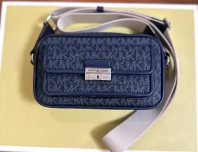 Michael Kors navy monogram crossbody bag, good condition