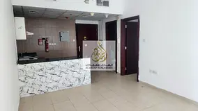 One bedroom, living room, 2 bathrooms, and open-plan kitchen with parking in City Tower, Ajman.