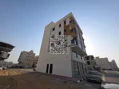 Residential-commercial building for sale in Al Aliyah, Ajman. The building sits on a land area of 