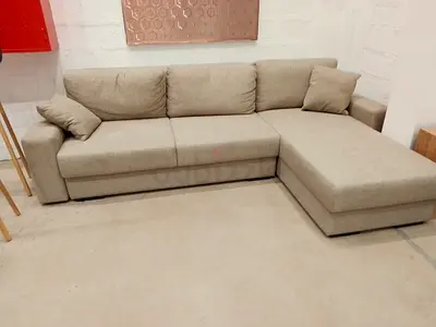 Beige L-shaped Corner Sofa with Ottoman - Good Condition