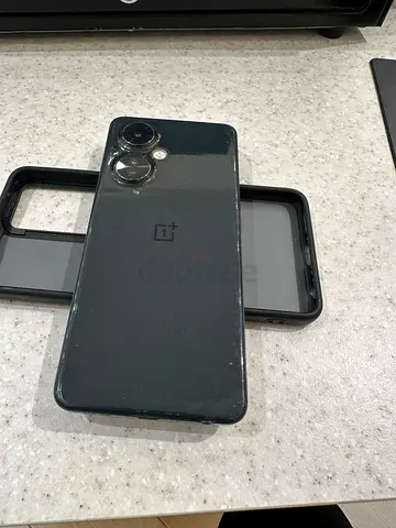 OnePlus smartphone in good condition with original case