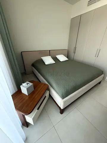 Queen size bed frame with headboard and bedside table - good condition