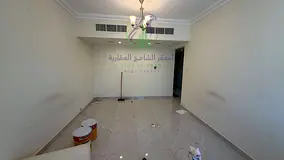 Two bedroom apartment for annual rent in Al Majaz 2 Sharjah free parking spacious layout modern fini