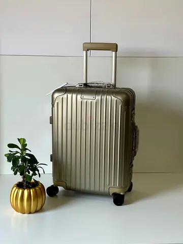 Rimowa tatinum hard-shell carryon suitcase (small/ cabin size) with spinner wheels