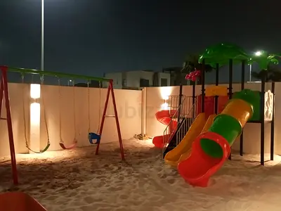 Outdoor kids playset with slides and swings - good condition