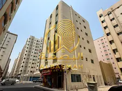 Building for sale in Sharjah, Al-Shuwaiheen area. Excellent location: a corner plot facing two aspha