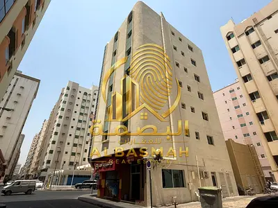 للبيع بنايه بالشارقه منطقه الشويهين موقع ممتاز زاويه علي شارعين اسفلت دخل 11%