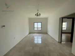 2BR with Balcony in Al Rashidiya 1, near Al Rawabi Market, Best Price & Spacious Layout.