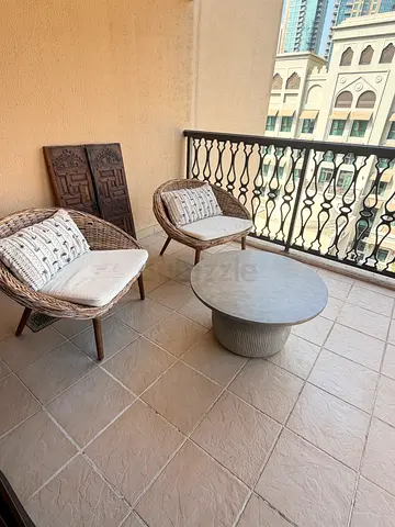 Outdoor balcony set — 2 rattan chairs with cushions and round coffee table