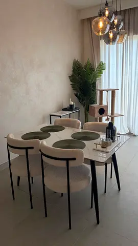 Modern marble-effect dining table with 4 upholstered boucle chairs