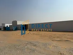 Enclosed yard for rent in Al Sajaa | Total area: 10,000 sq. ft. | Includes 25 kW electricity supply