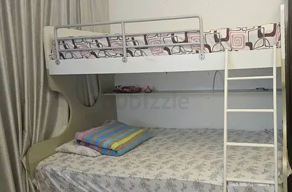 White wooden bunk bed with ladder — good condition