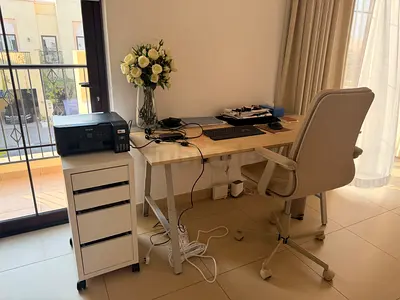 IKEA White Desk with Rolling Drawer Unit and Ergonomic Office Chair