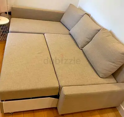 Beige L-shaped Sofa Bed with Storage Good Condition