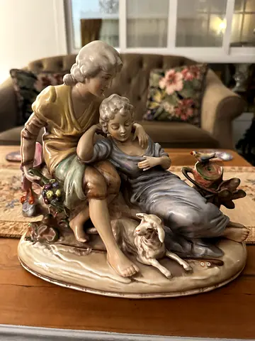 Vintage Porcelain Figurine Group — Seated Couple with Child and Dog