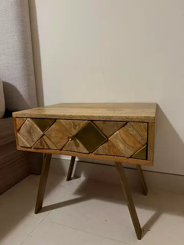 Wooden Bedside Table with Geometric Drawer and Brass Accents