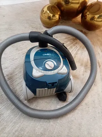 Used compact canister vacuum cleaner - working condition