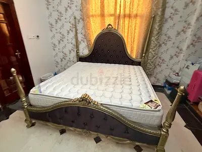 Super king size ornate upholstered bed frame with mattress included side table and dressing table