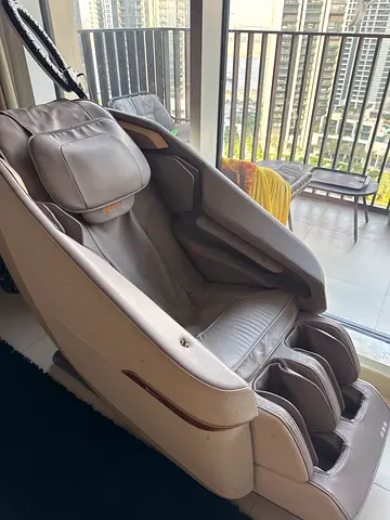 Full-body electric massage chair in beige — good condition