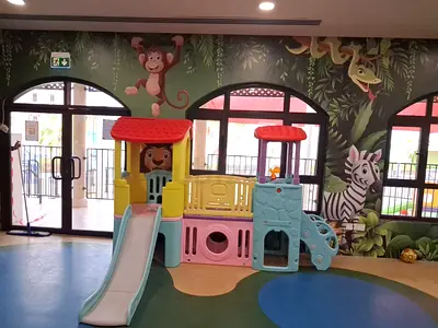 Indoor plastic playset with slide — good condition