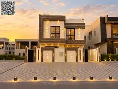A dream villa in Al Helio, Ajman, featuring an elegant design, high-end finishes, and a location clo