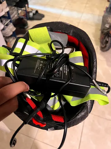 Electric scooter with helmet, LED straps and charger and maintenance tools. Price decreased frm 1000