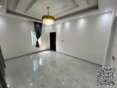 Spacious villa for rent in Al Yasmeen, featuring 5 bedrooms, a majlis, built-in wardrobes, and spli
