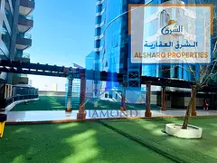 Two bedrooms and a living room in a prime location on Al Ittihad Street, featuring an unobstructed s