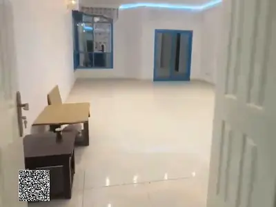 Lowest price for a 3-bedroom apartment with a living room in Al Khor Towers, Ajman.