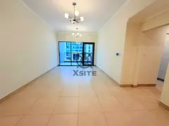 Unfurnished 2 BR | Closed Kitchen | Dewa Building