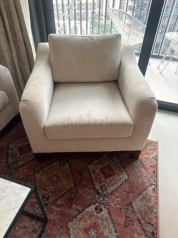 Light beige single armchair in excellent condition