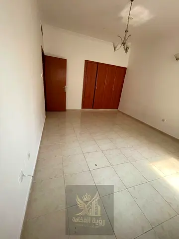Spacious 2BR Apartment in Al Qasimia with Built in Wardrobes Free Parking and Landlord AC