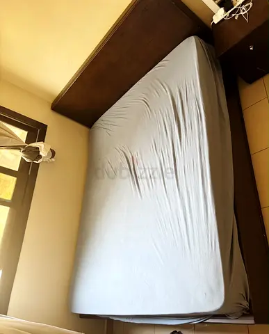 Queen size wooden bed frame with mattress
