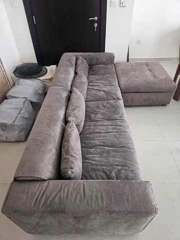 L-shaped grey/vizon fabric sofa with ottoman - good condition