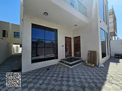 Modern villa with 5 master bedrooms and a maid's room for sale in Al Zahia, Ajman.