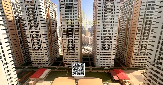 2-Bedroom Apartment with Living Area & Garden View – Ready for Immediate Handover (Includes Parking